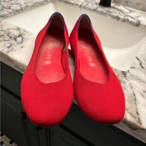 Red Rothty’s round toe flats.